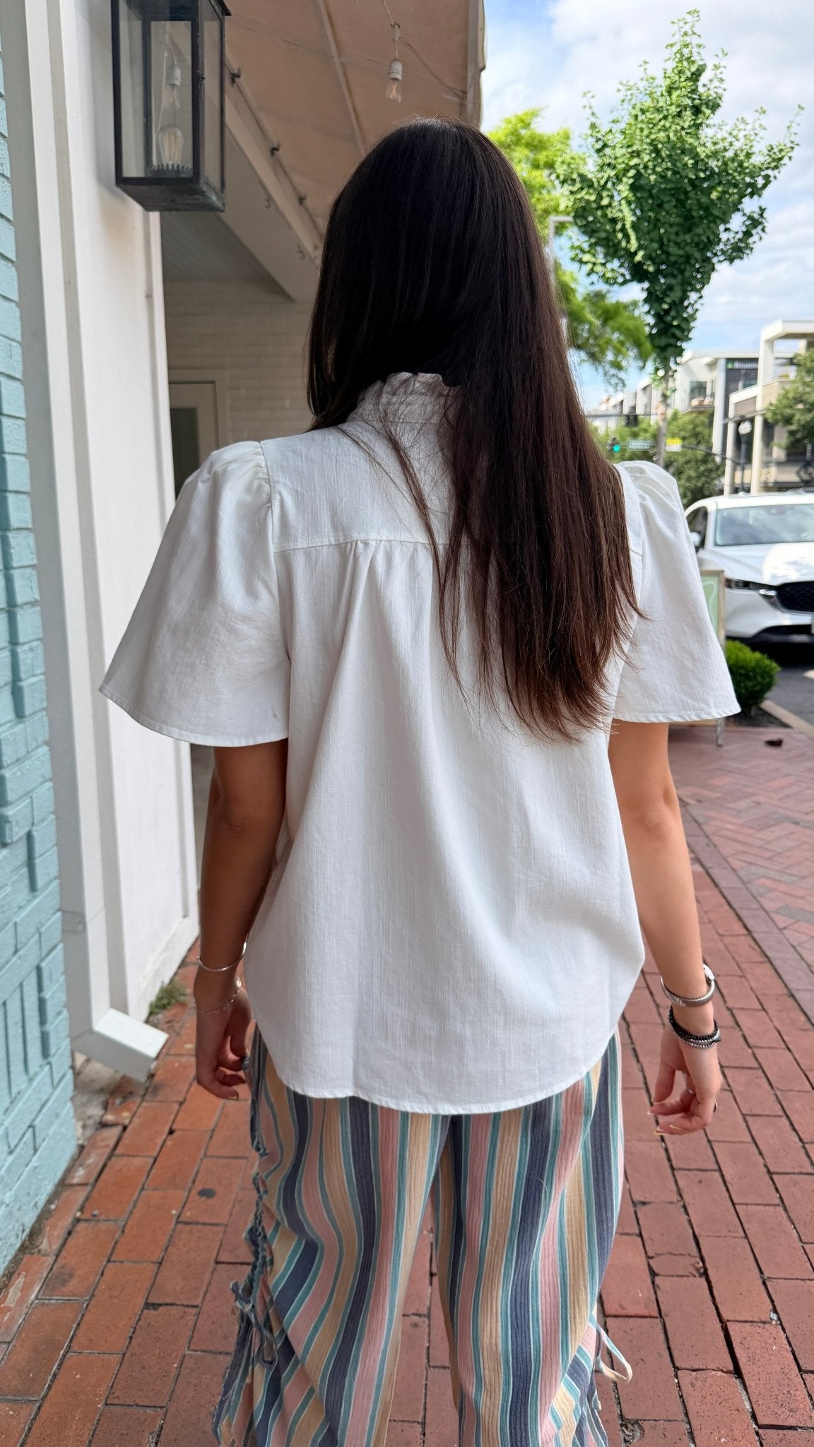 White Pearl Snap Ruffle Front Top - Rebecca James Clothing