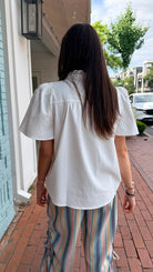 White Pearl Snap Ruffle Front Top - Rebecca James Clothing